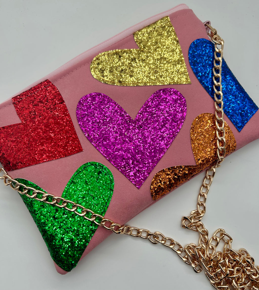 Pale pink faux suede embellished heart glitter bag