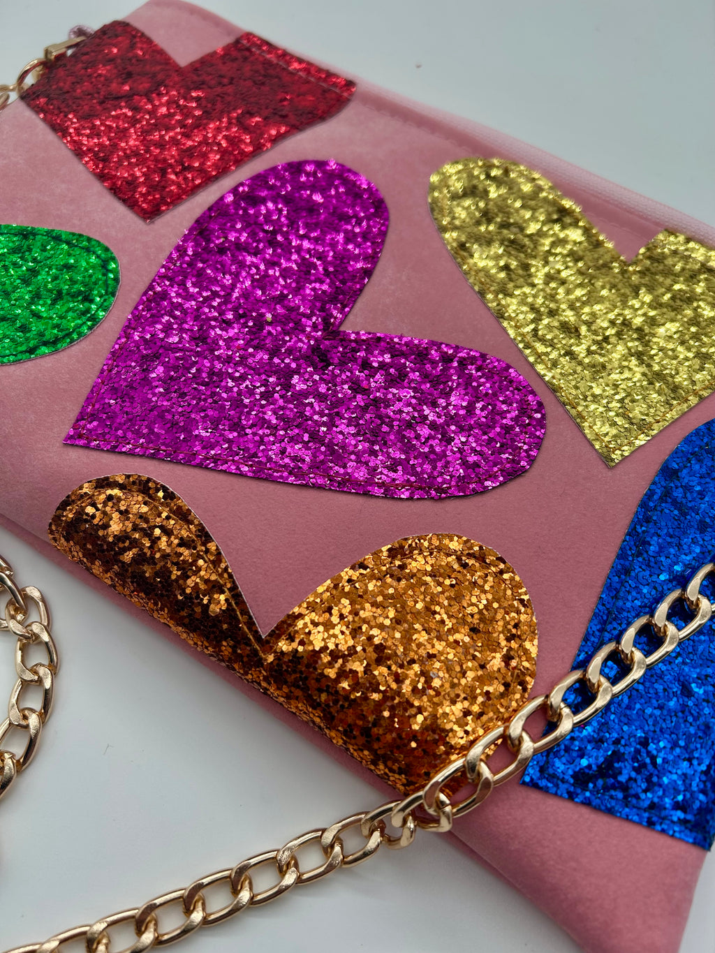 Pale pink faux suede embellished heart glitter bag