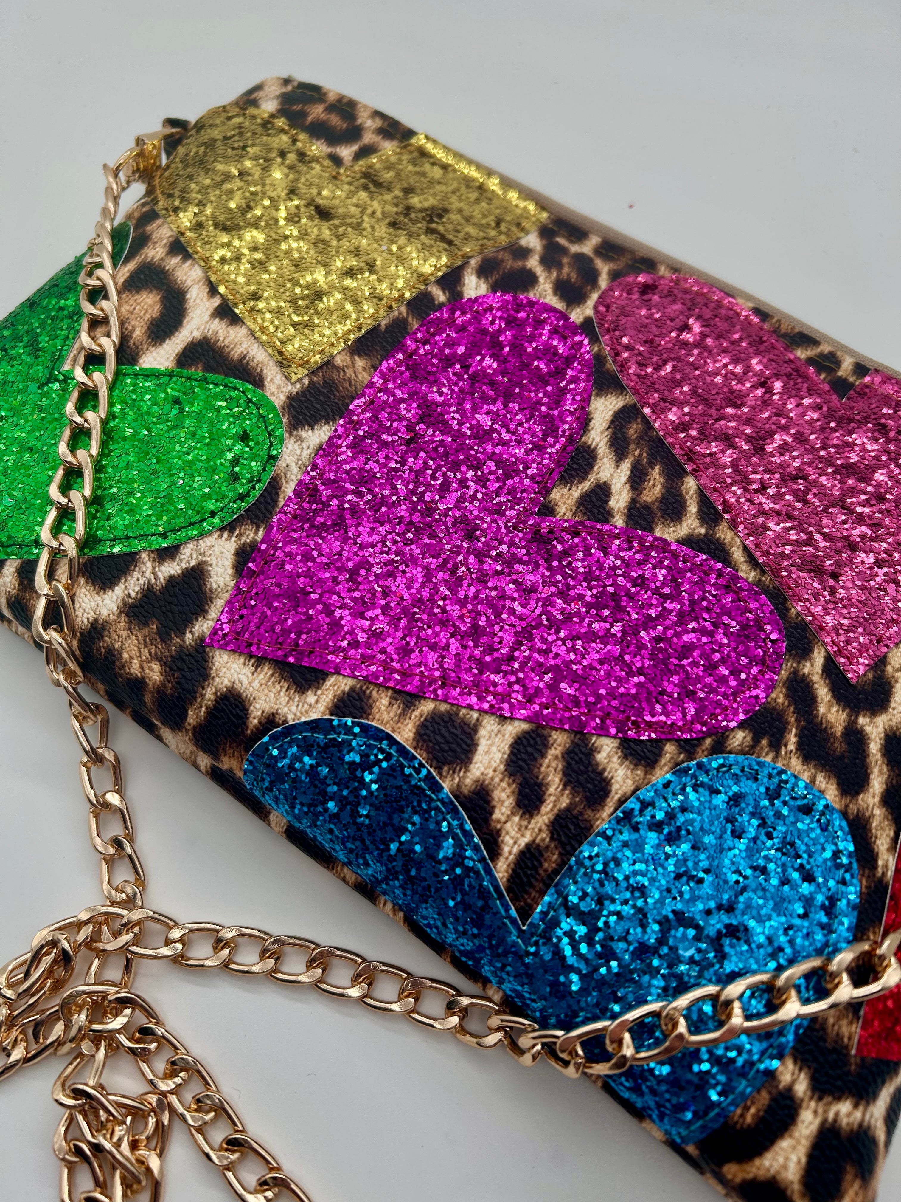 Leopard print embellished heart glitter bag