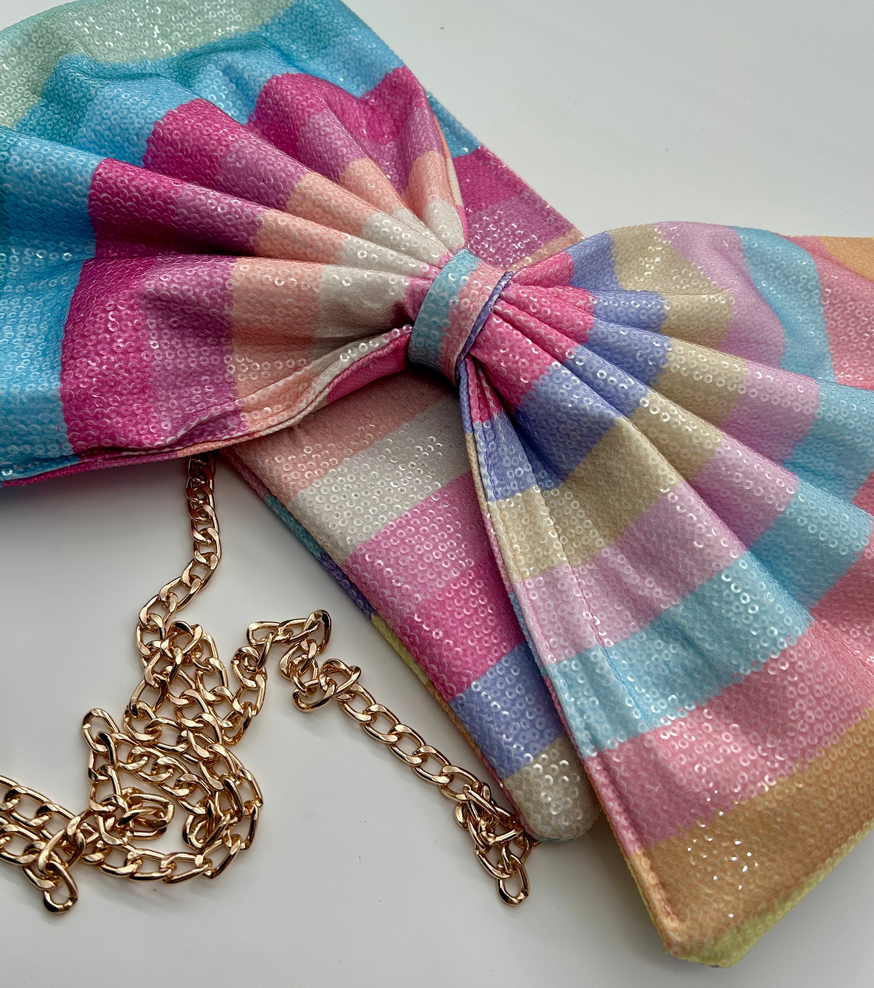 Rainbow stripe sequin bow bag