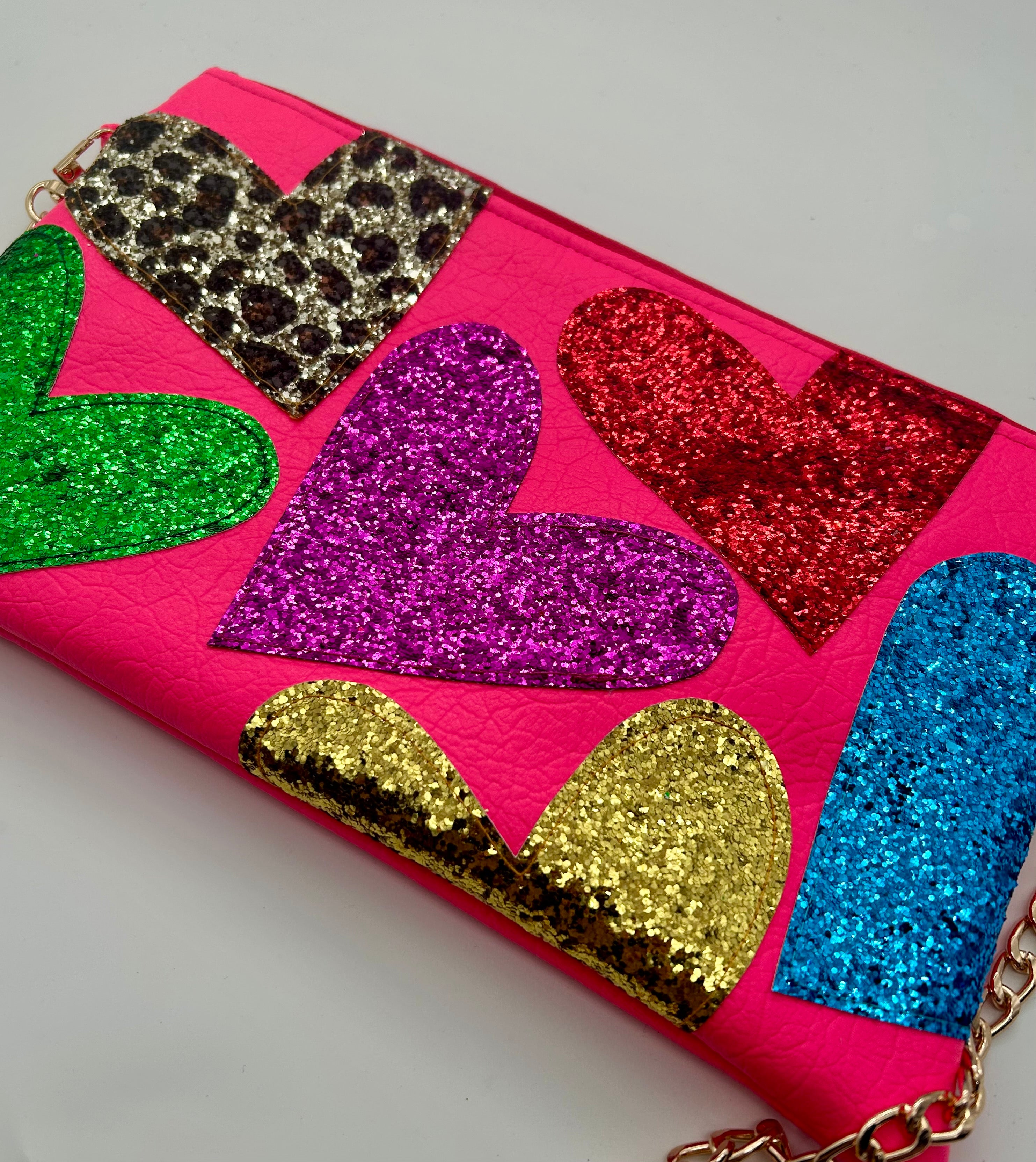 Neon pink embellished glitter heart bag