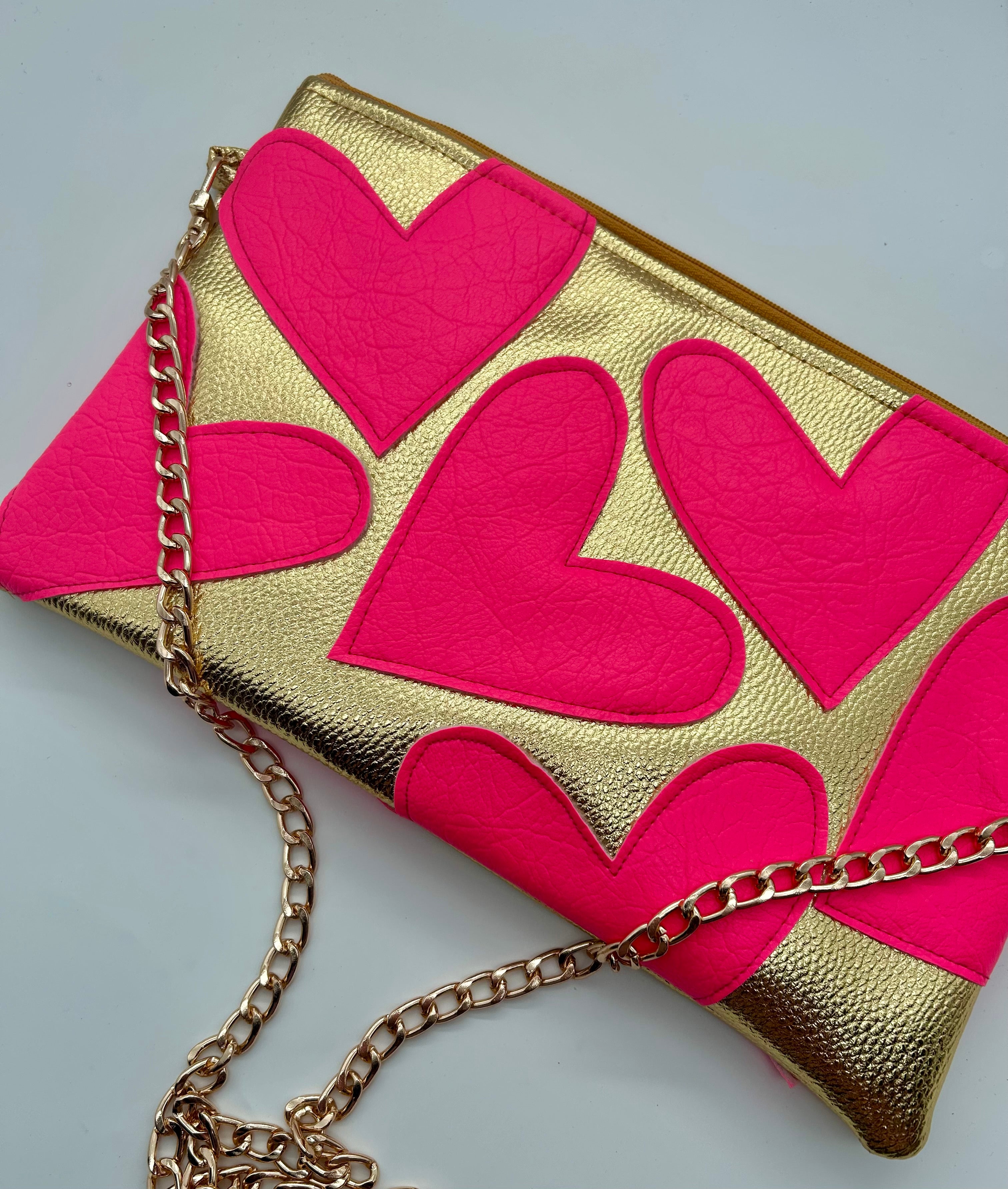 Gold and neon pink heart bag
