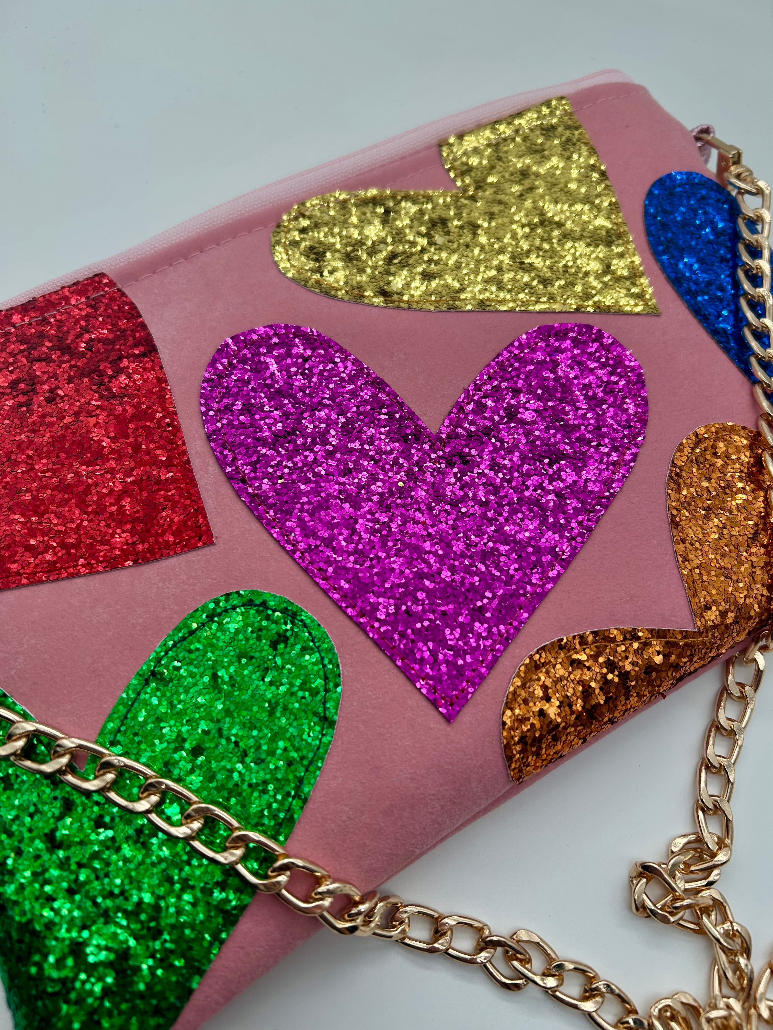 Pale pink faux suede embellished heart glitter bag