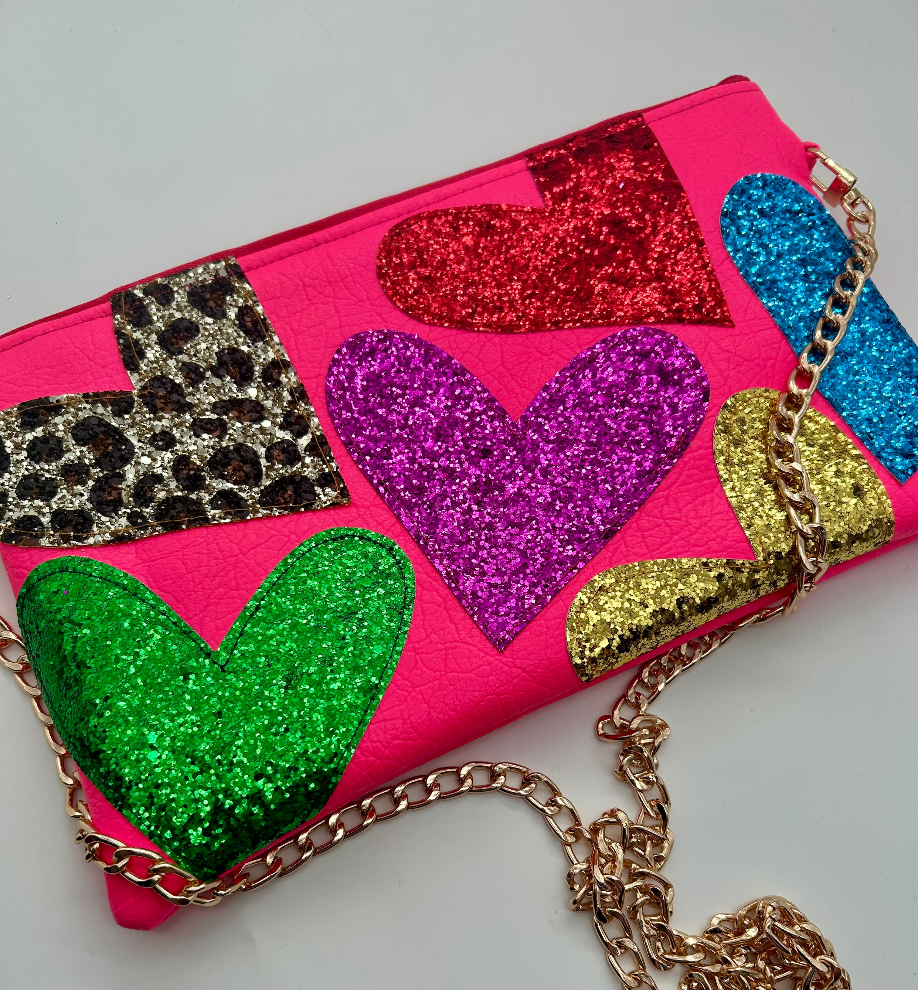 Neon pink embellished glitter heart bag