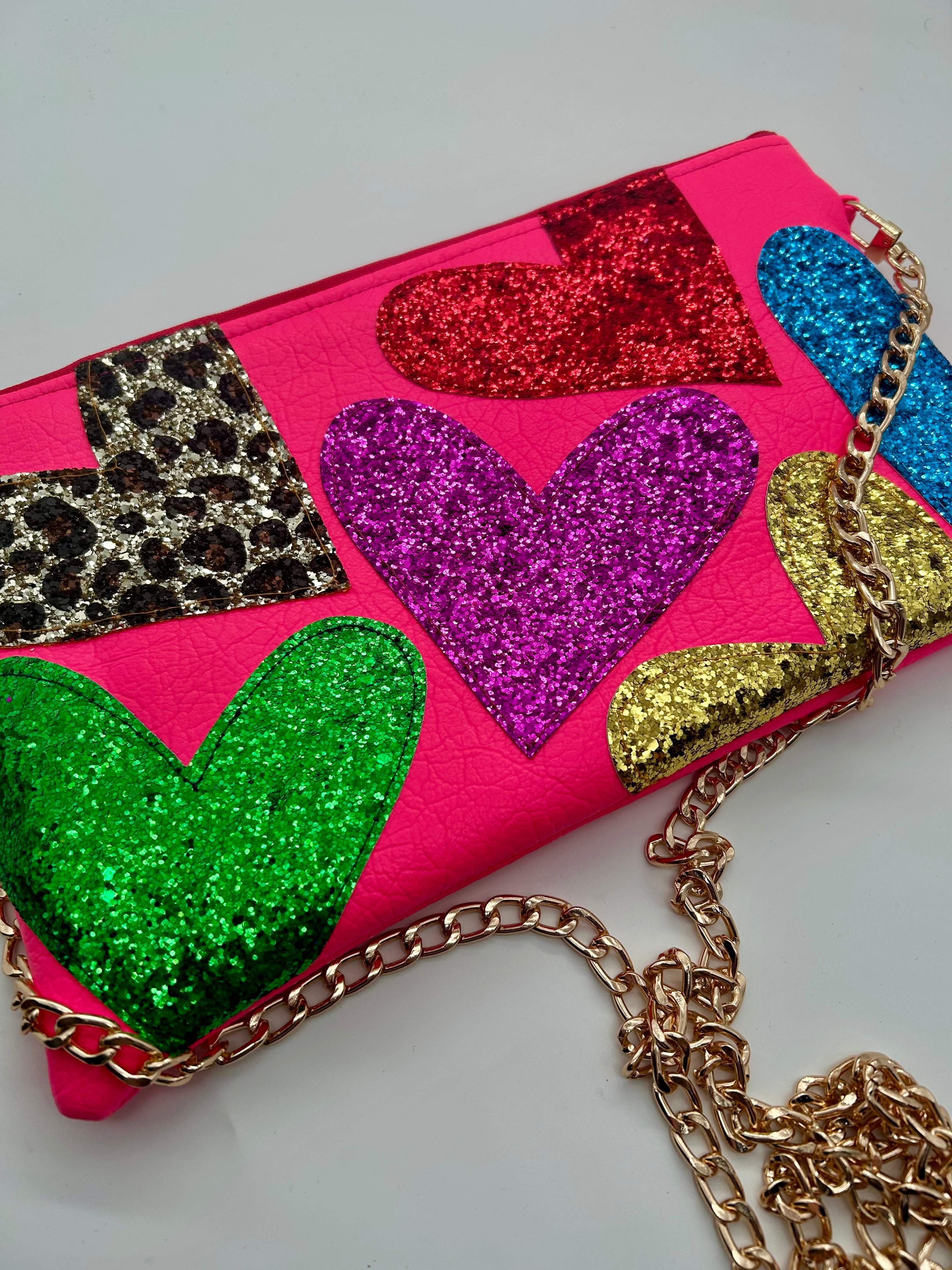Neon pink embellished glitter heart bag