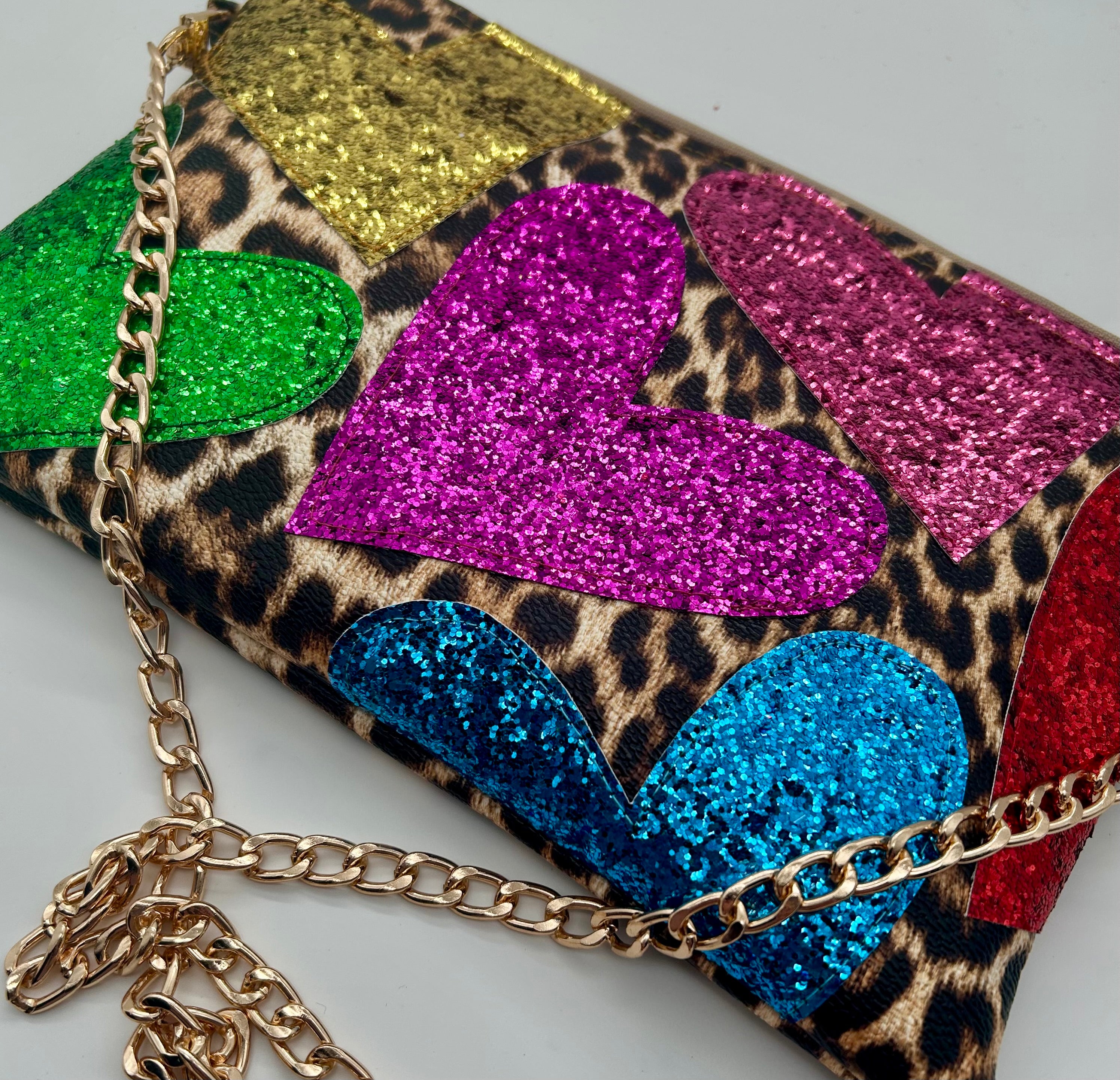 Leopard print embellished heart glitter bag