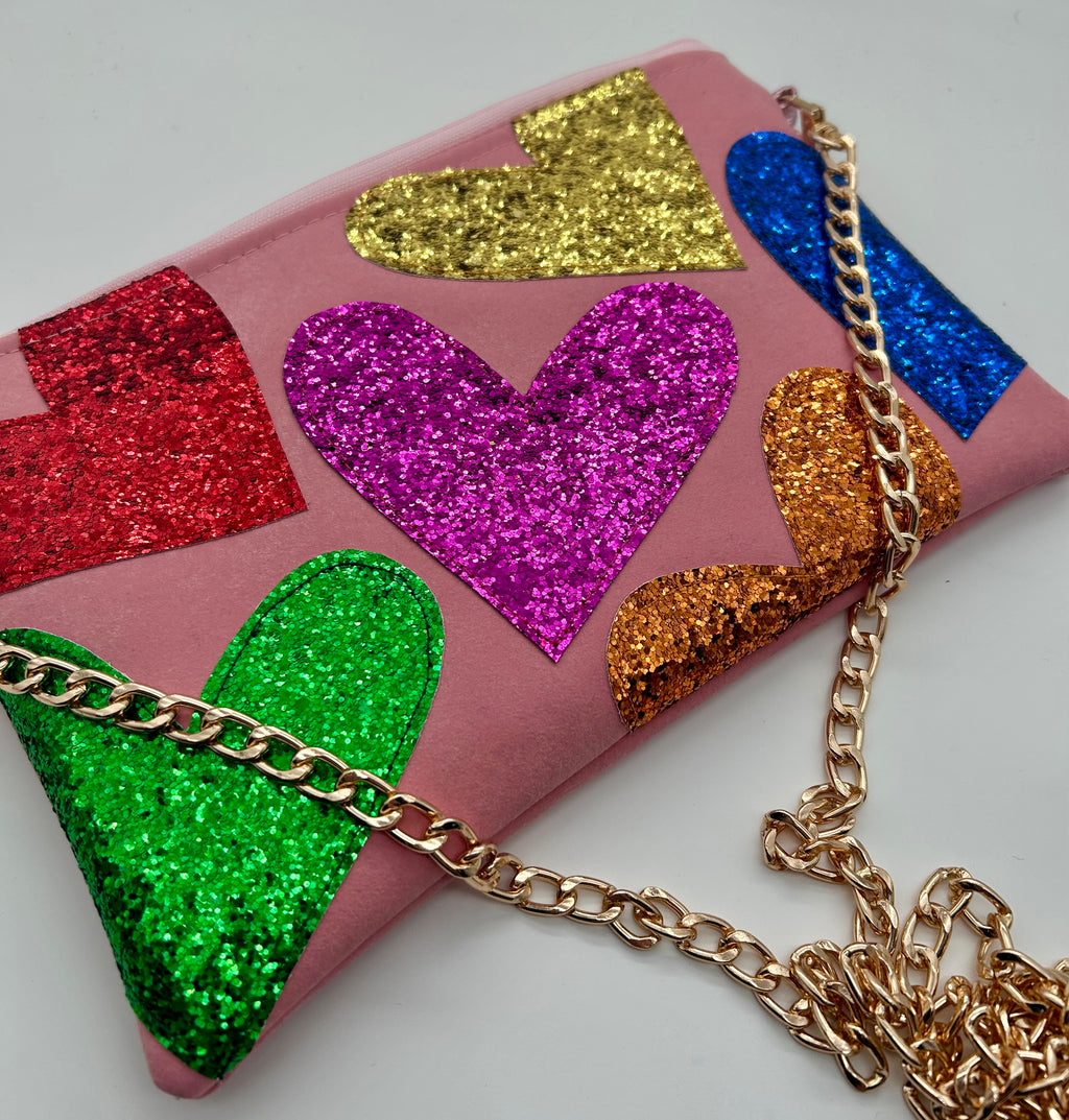 Pale pink faux suede embellished heart glitter bag