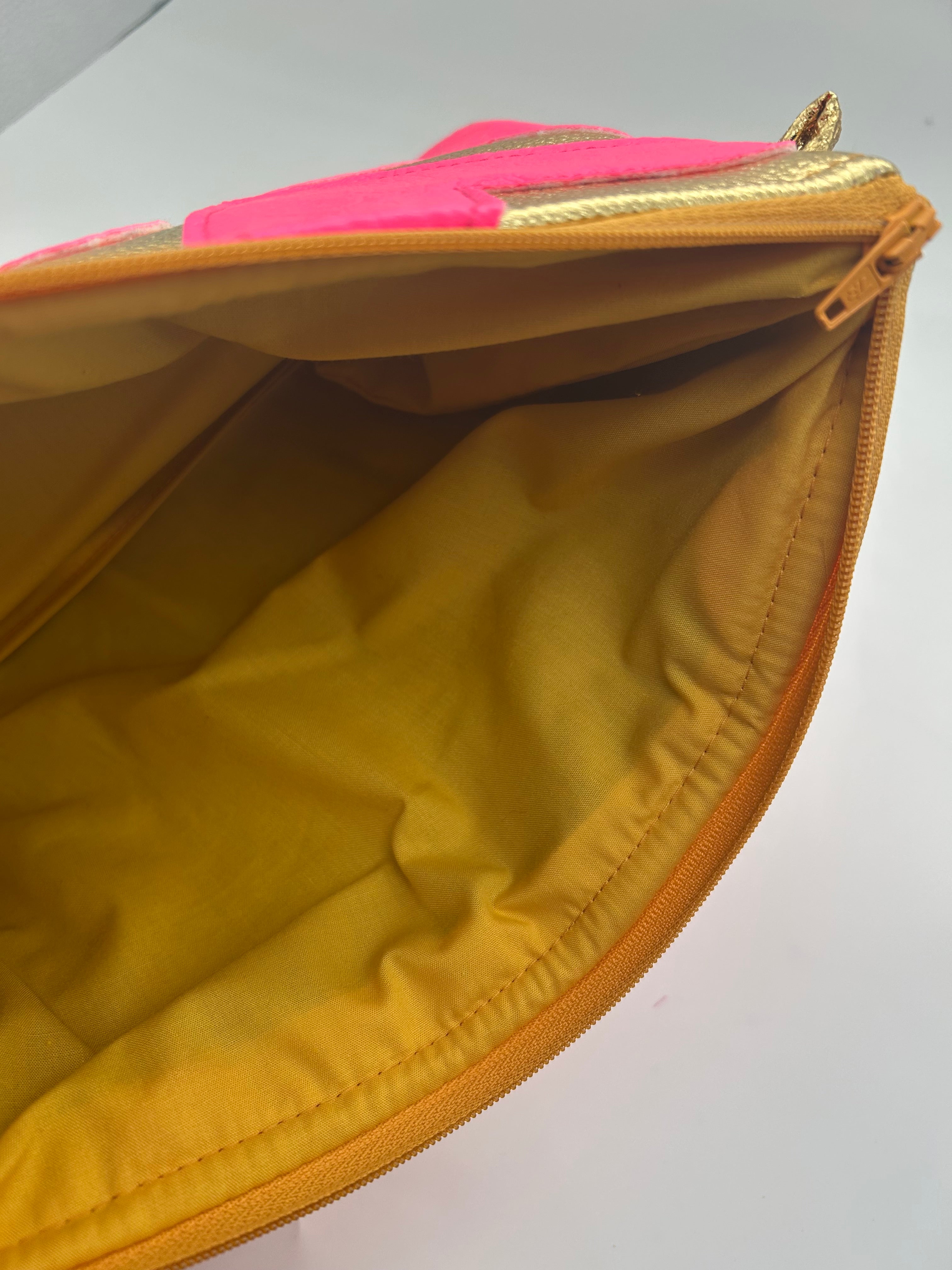 Gold and neon pink heart bag