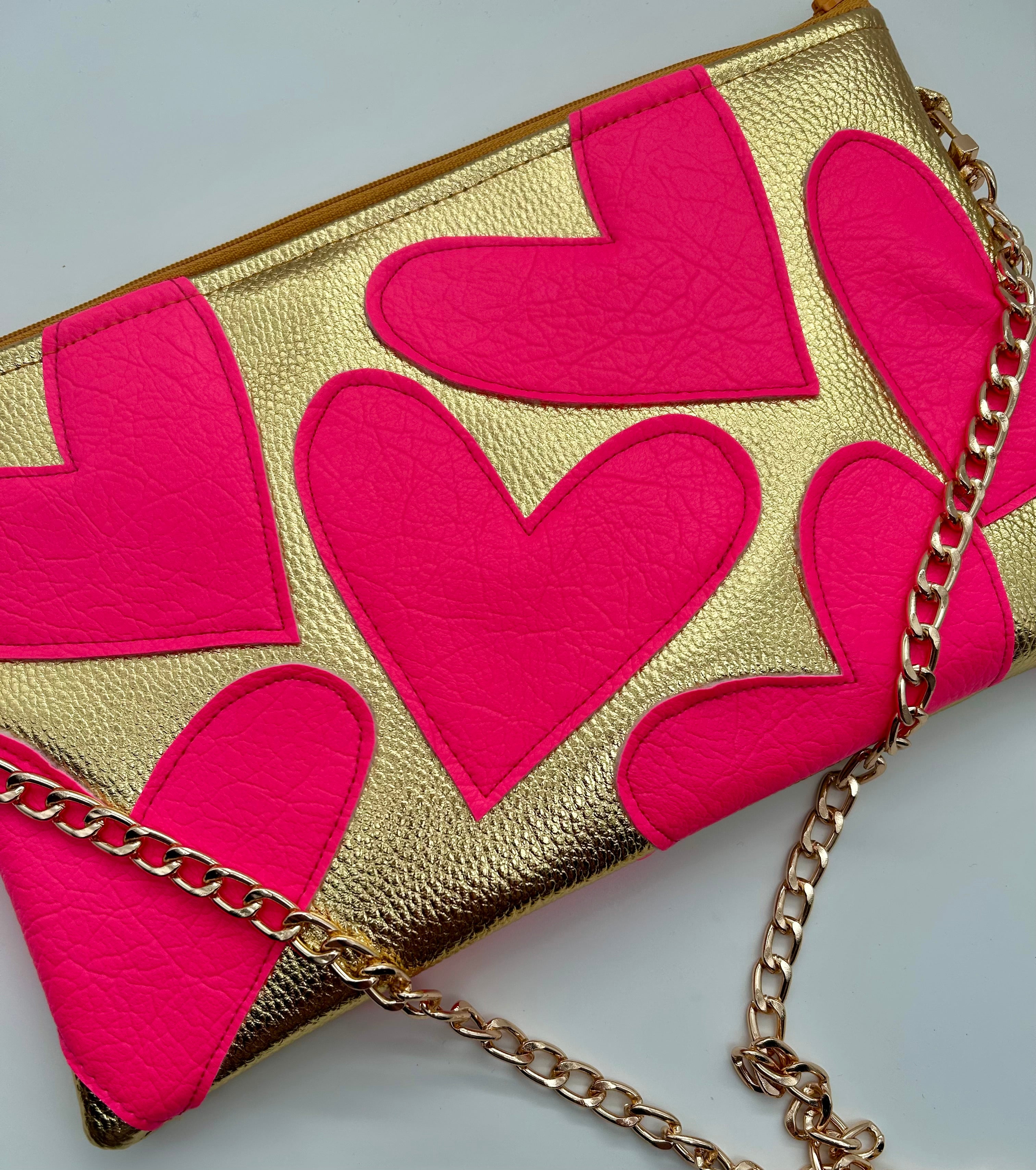 Gold and neon pink heart bag