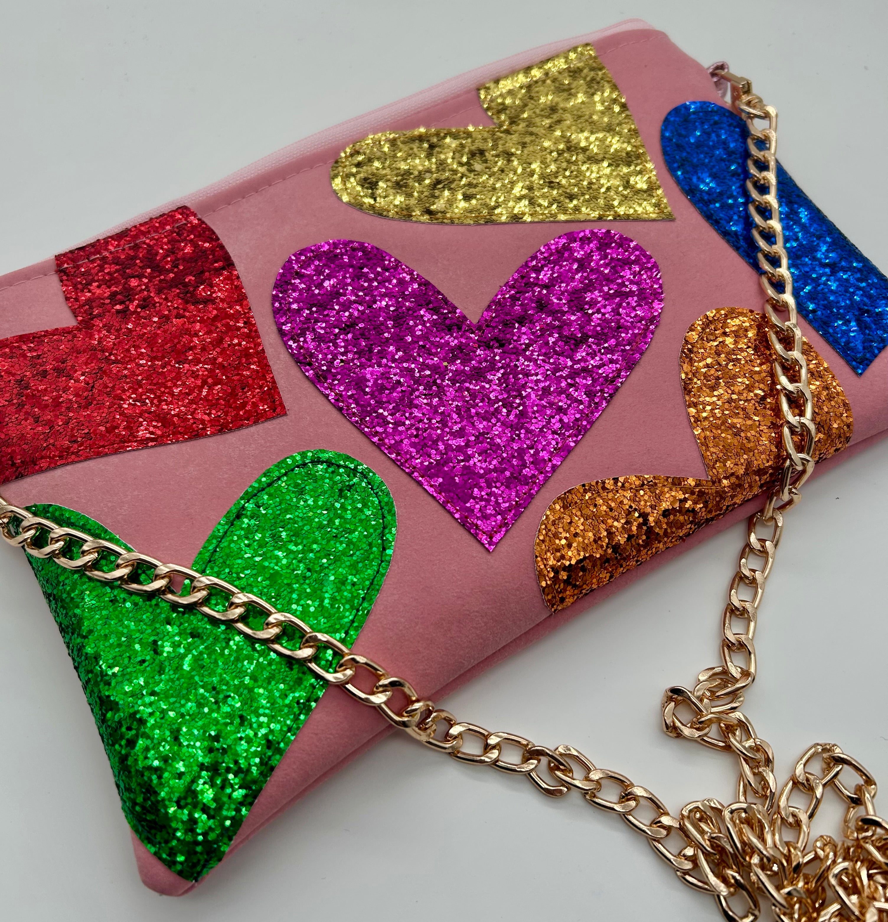 Pale pink faux suede embellished heart glitter bag