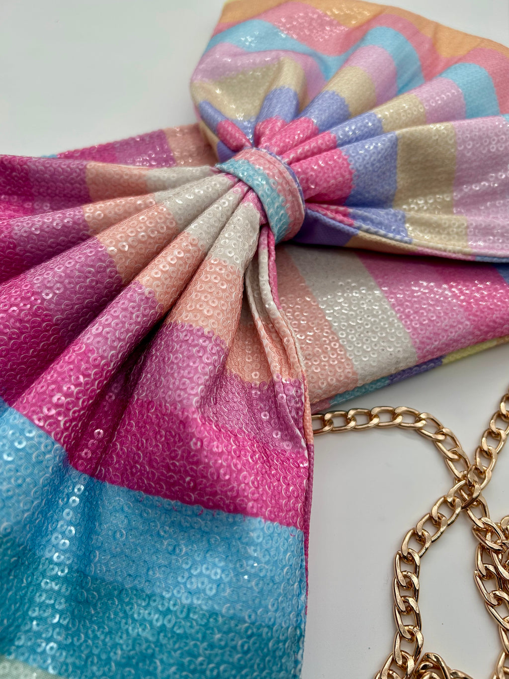Rainbow stripe sequin bow bag
