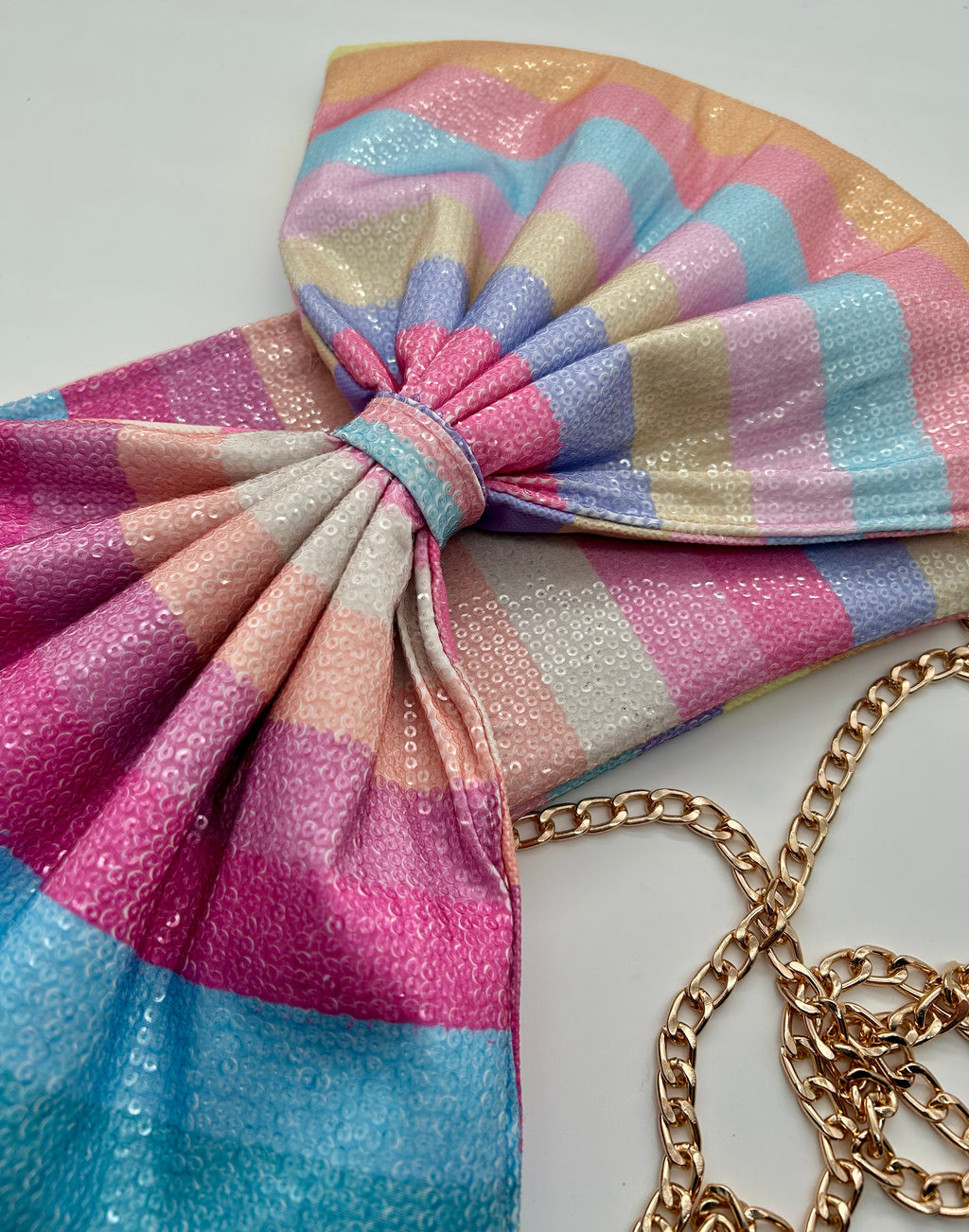Rainbow stripe sequin bow bag